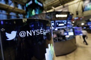 An updated phone post on the floor of the New York Stock Exchange features a Twitter logo, Monday, Nov. 4, 2013, in New York. Twitter Inc. will begin trading on the New York Stock Exchange on Thursday morning after setting a price for its IPO sometime Wednesday evening. (AP Photo/Richard Drew)